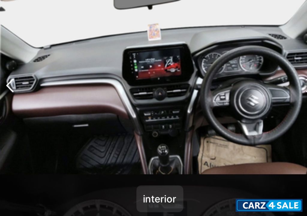 White Maruti Suzuki Grand Vitara Sigma