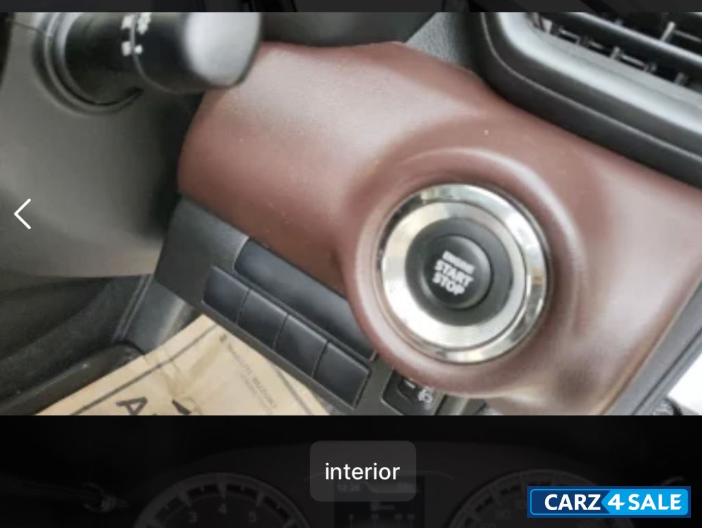 White Maruti Suzuki Grand Vitara Sigma