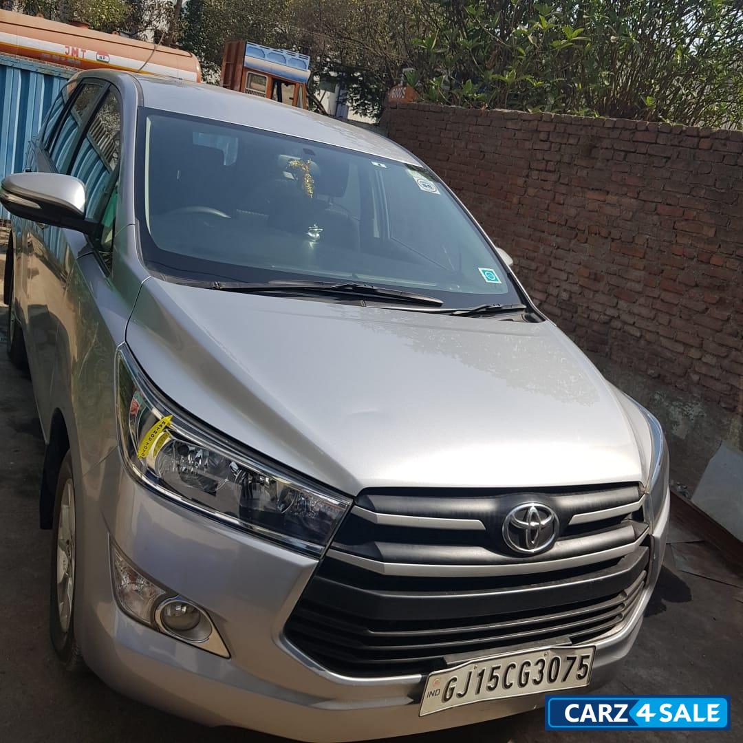 Silver Toyota Innova Crysta 2.4 G 8 STR