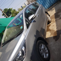 Silver Toyota Innova Crysta 2.4 G 8 STR
