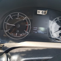 Silver Toyota Innova Crysta 2.4 G 8 STR