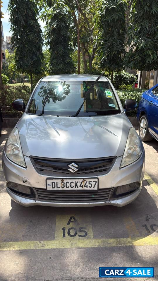 Silver Maruti Suzuki Dzire LXI O