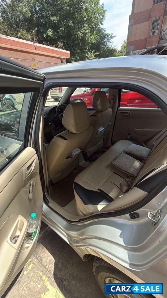 Silver Maruti Suzuki Dzire LXI O