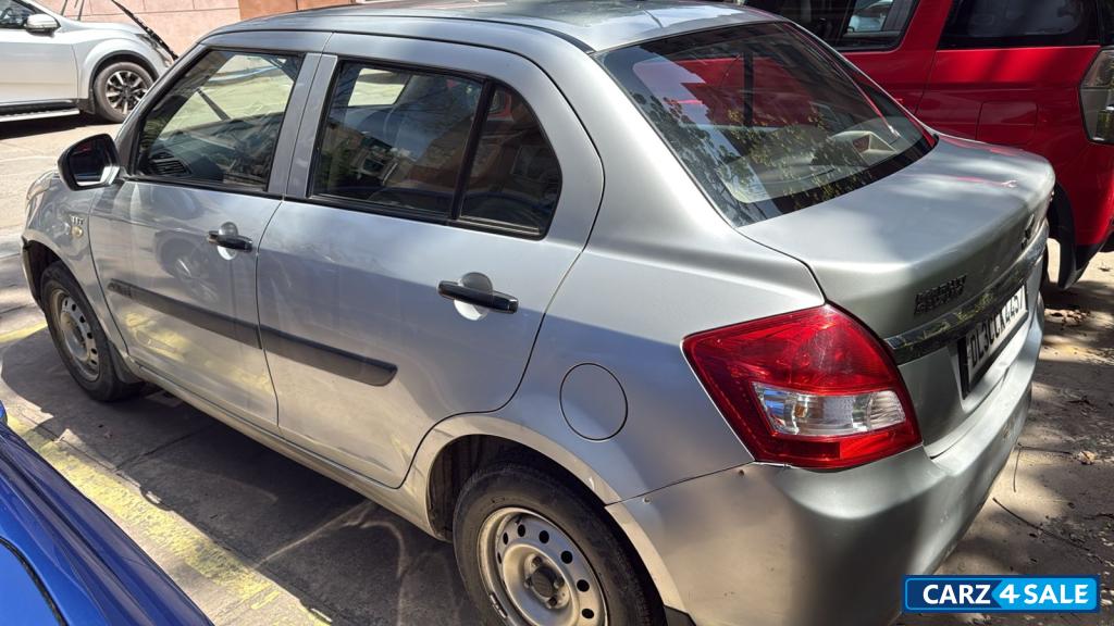 Silver Maruti Suzuki Dzire LXI O