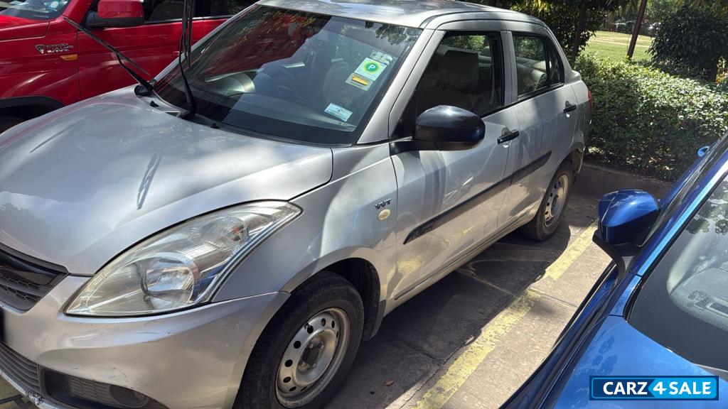 Silver Maruti Suzuki Dzire LXI O