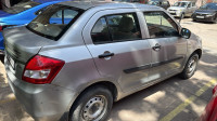 Silver Maruti Suzuki Dzire LXI O