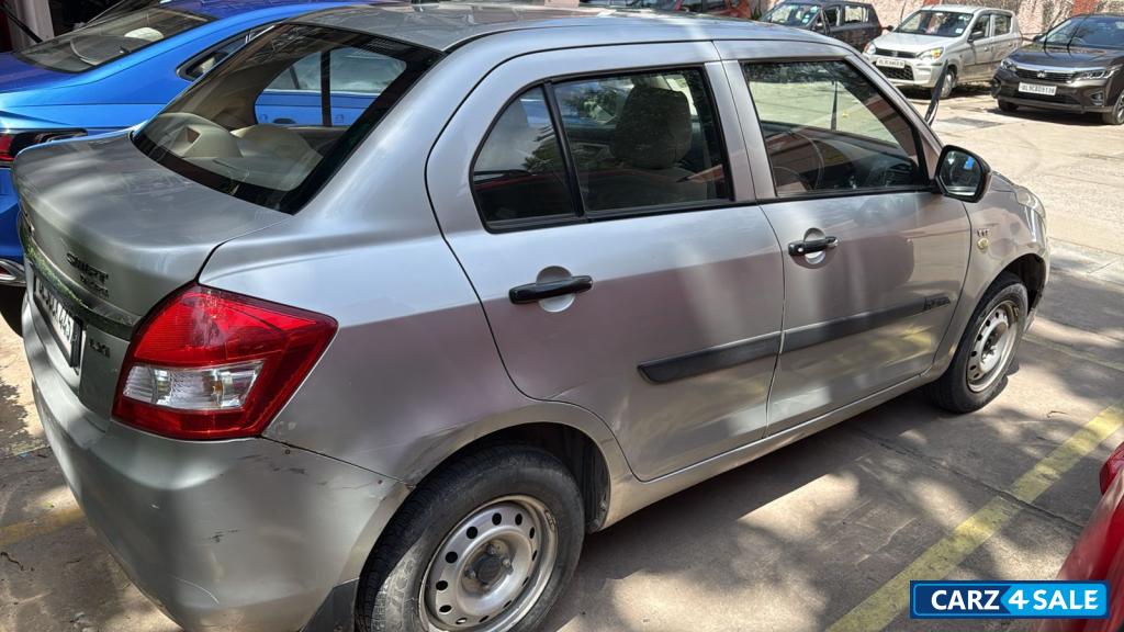 Silver Maruti Suzuki Dzire LXI O
