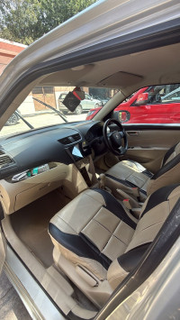 Silver Maruti Suzuki Dzire LXI O