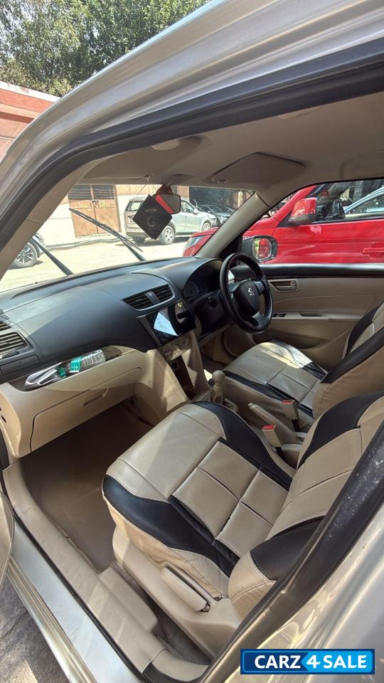 Silver Maruti Suzuki Dzire LXI O