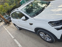 White Skoda Kushaq Ambition 1.0 MT
