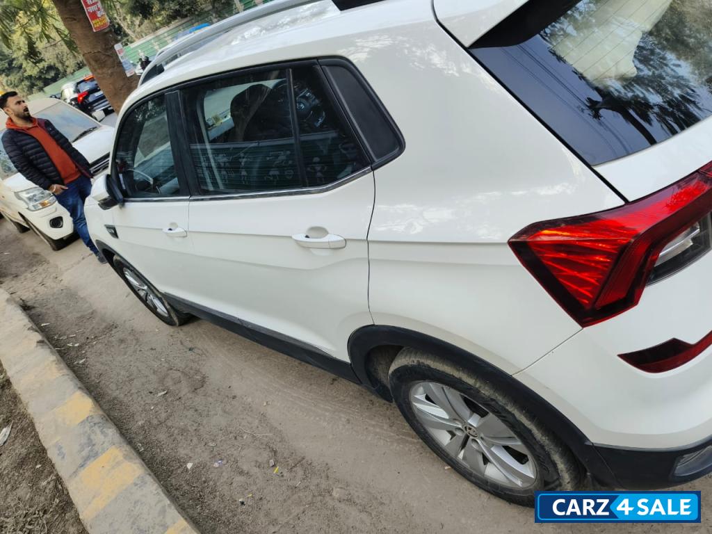 White Skoda Kushaq Ambition 1.0 MT