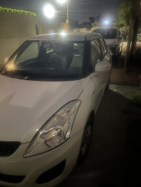 White Maruti Suzuki Dzire vxi