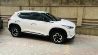 Storm White Nissan Magnite XV MT