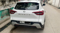 Storm White Nissan Magnite XV MT