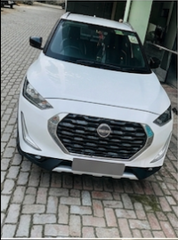 Storm White Nissan Magnite XV MT