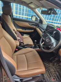 Golden Brown Honda Elevate ZX SUV