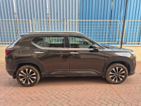 Golden Brown Honda Elevate ZX SUV
