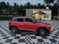 Blazing Red Maruti Suzuki Vitara Brezza VDI