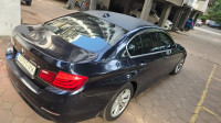 Blue BMW 5-Series 520D