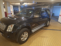 Black Isuzu MU7 Manual CKD-BS4