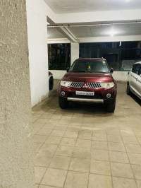 Metallic Red Mitsubishi Pajero Sport 4x4 MT