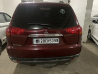 Metallic Red Mitsubishi Pajero Sport 4x4 MT