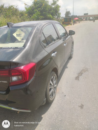 Golden Brown Metallic Honda Amaze VX CVT