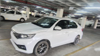 Pearl White Honda Amaze Vx-mt ace edition