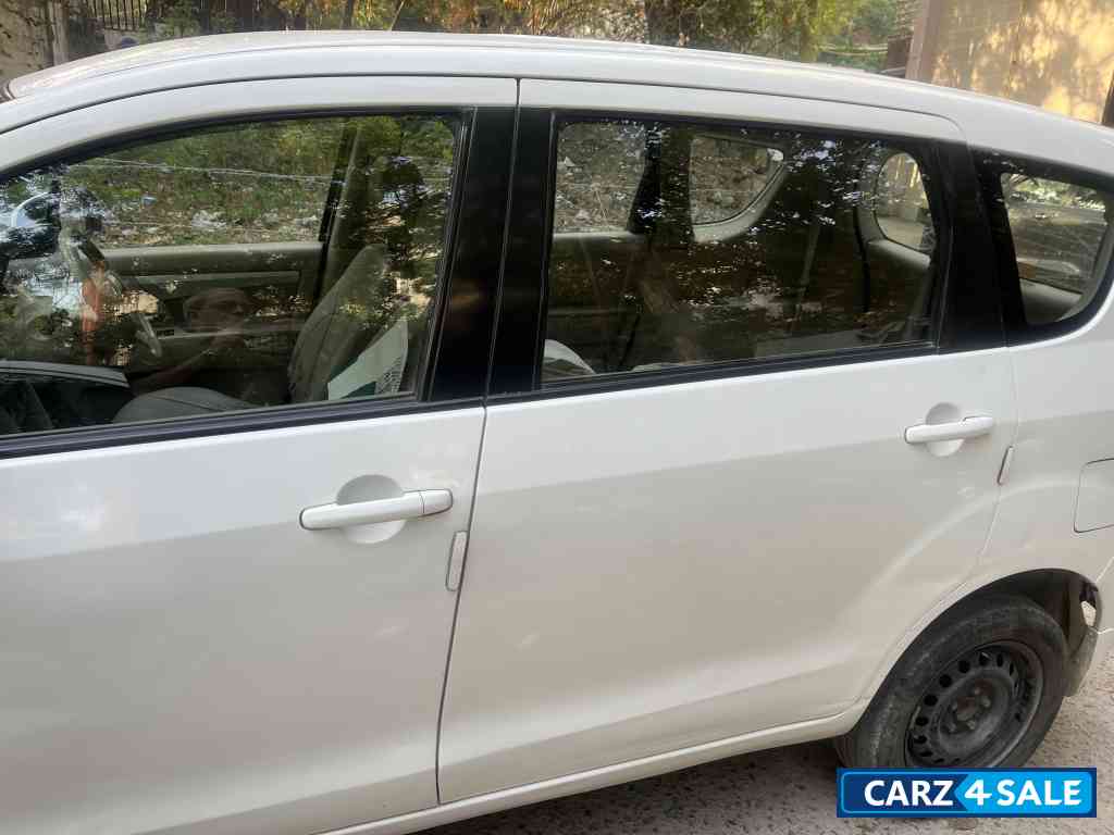 White Maruti Suzuki Ertiga Vxi petrol