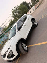 White Tata Harrier Xt plus