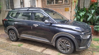 Aurora Black Pearl Kia Carens G1.4 6MT LUXURY 7 seater