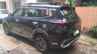 Aurora Black Pearl Kia Carens G1.4 6MT LUXURY 7 seater