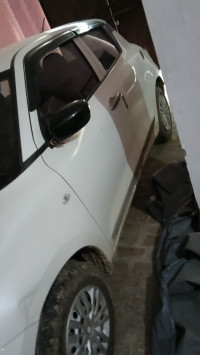 Maruti Suzuki Swift Lxi