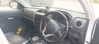White Maruti Suzuki Alto VXI plus