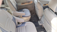Grey Toyota Innova 2011