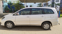 Grey Toyota Innova 2011