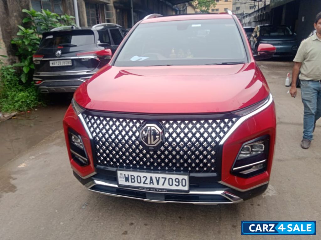 Red MG Hector Plus Sharp pro cvt 1.5 automativ 7 seater Red MG Hector Plus Sharp pro cvt 1.5 automativ 7 seater