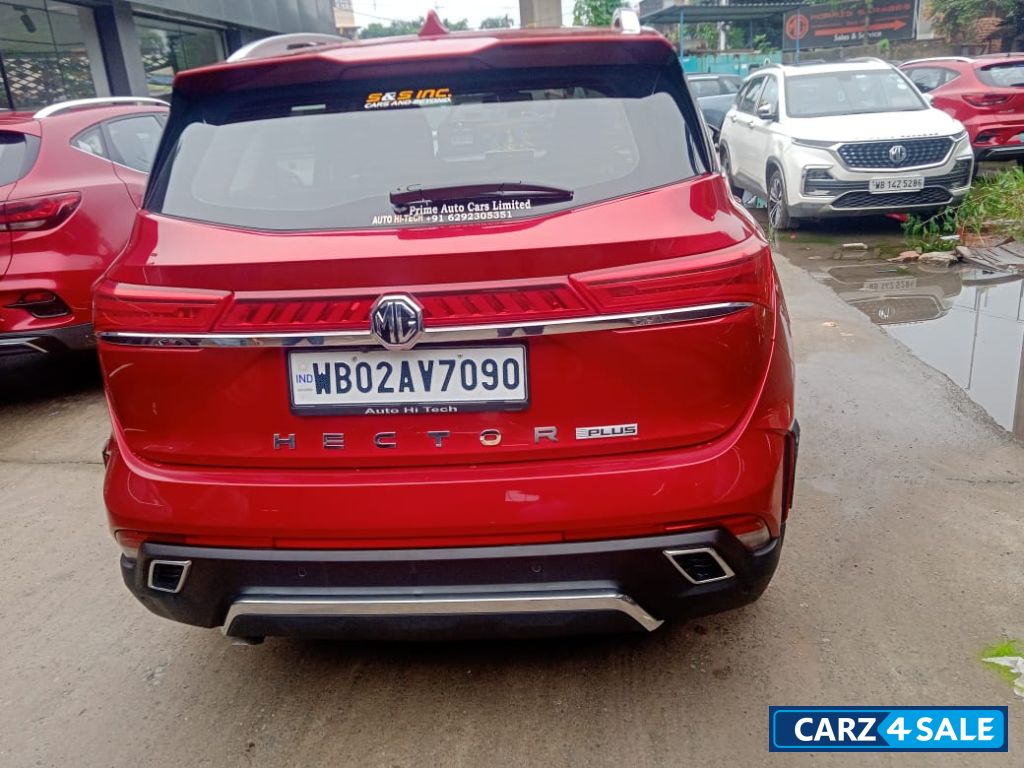 Red MG Hector Plus Sharp pro cvt 1.5 automativ 7 seater Red MG Hector Plus Sharp pro cvt 1.5 automativ 7 seater