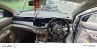 Silver Maruti Suzuki Ertiga VXI Smart Hybrid