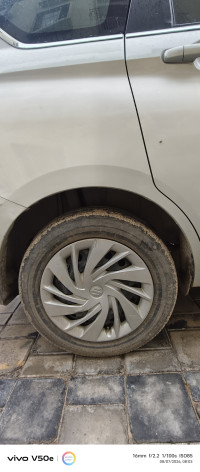 Silver Maruti Suzuki Ertiga VXI Smart Hybrid