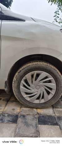 Silver Maruti Suzuki Ertiga VXI Smart Hybrid