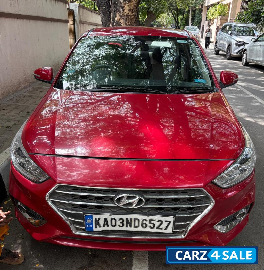 Fiery Red Hyundai Verna VTVT SX 1.6