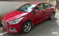 Fiery Red Hyundai Verna VTVT SX 1.6