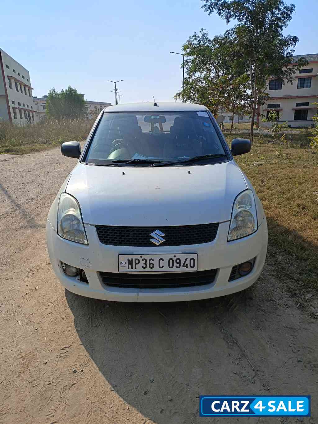 White Maruti Suzuki Swift VXI White Maruti Suzuki Swift VXI