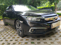 Golden Brown Honda Civic zx