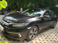 Golden Brown Honda Civic zx