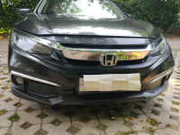 Golden Brown Honda Civic zx
