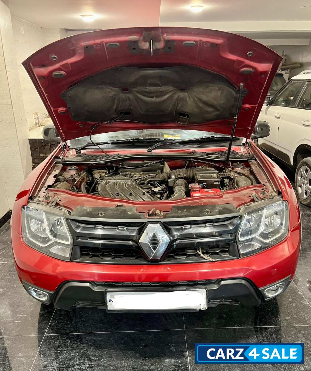 Fiery Red Renault Duster RXC CVT PETROL