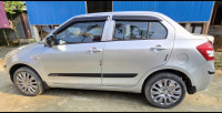 Silky Silver Maruti Suzuki Swift Dzire