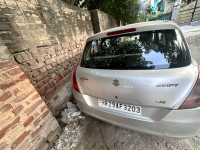 Silver Maruti Suzuki Swift Lxi
